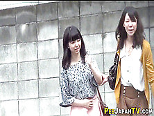 Asian Stunners Cower And Piss In Public Toilet