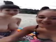Two Friends Sitting Naked Outside