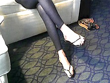 Amateur Doll In Black Leggings Showing Off Her Sexy Feet In Flip-Flops
