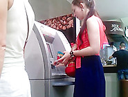 A Girl With A Friend Near The Cash Machine In Upskirt