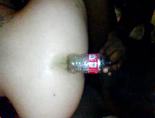 Bottle In The Ass