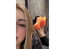Beautiful Blonde Babe Posing In Her Orange Socks In A Solo