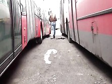 Sexy Blonde Pees Between 2 Buses