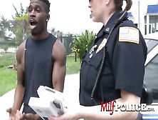 Suspect Gets His Cock Sucked And Ridden By Horny Milf Cops