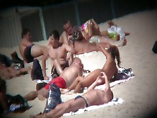 Voyeur On The Beach Capturing A Tanned And Naked Girl