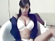 Busty Cam Girl Performing A Sexy Striptease Show