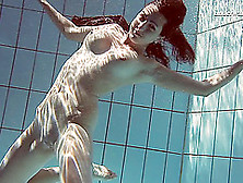 Sexy Sima Lastova Reveals Her Shaved Pussy While Swimming In The Pool