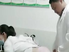 Chinese Doctor And Nurse Doggy In Hospital Office