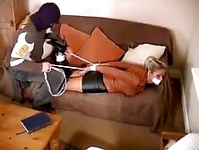 Blond Gets Hogtied In Leather Skirt And Boots